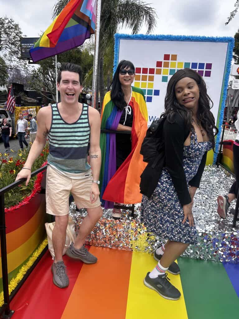 Blossom C. Brown posing with people on the Imperial Court of Los Angeles’ Pride Float. Credit: Blossom Brown
