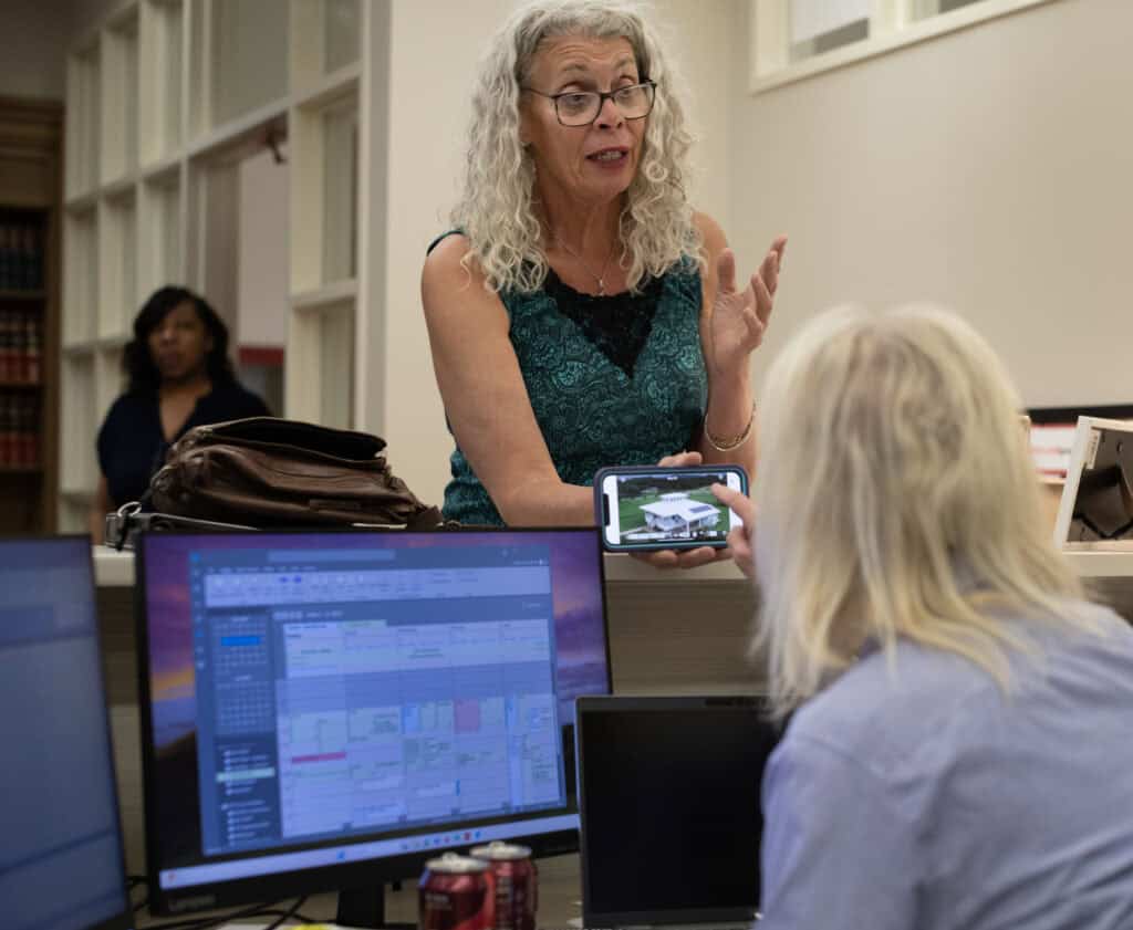 Vera Verbel shows Tita Kaus, at College of Law at Northern Illinois University