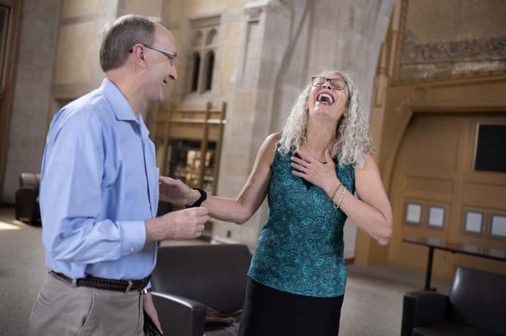 Vera Verbel visits with Greg Anderson, Dean for Career Opportunities and Professional Development at the College of Law at Northern Illinois University.