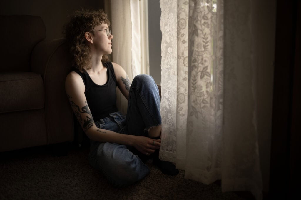 Morgan Peterson (they/them) often spends quiet time at home reading or watching the nature outside their window.